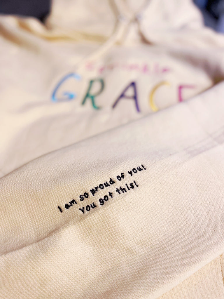 The Sprinkle Grace Project Sleeve Reminder Hoodie - January Delivery